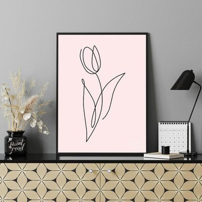 This elegant and minimalist artwork features a single tulip, rendered in a continuous, flowing blac… for lovely house