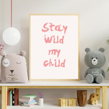 This poster features a powerful and heartwarming message, "Stay Wild My Child," presented in a bold… for nursery