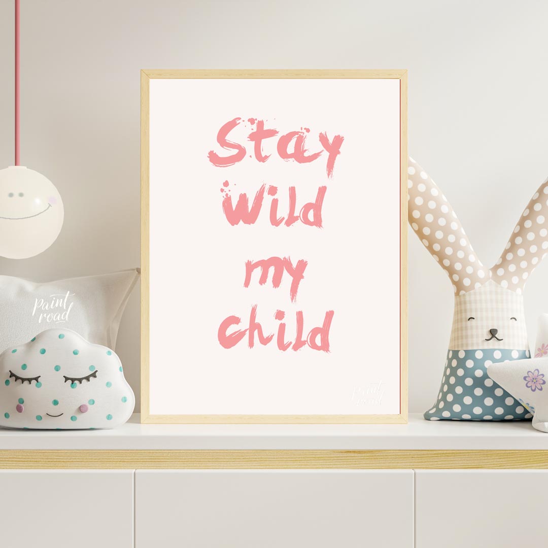 This poster features a powerful and heartwarming message, "Stay Wild My Child," presented in a bold… for nursery
