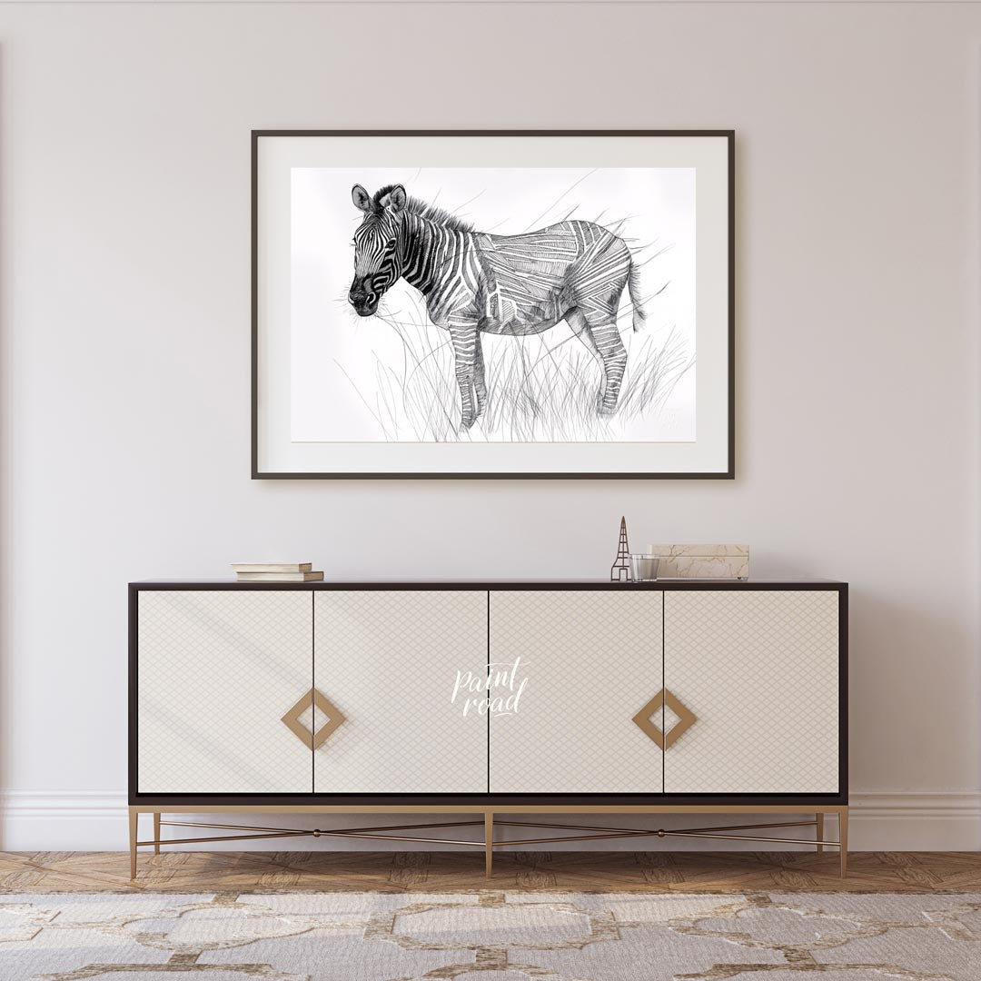 This striking black and white illustration portrays a zebra standing in a field of tall grass, comb… for entryway