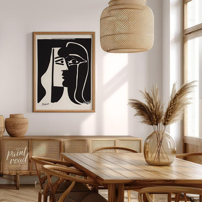 This stark and powerful black and white print, potentially “The Kiss” or a similar emotive work by … for dining room