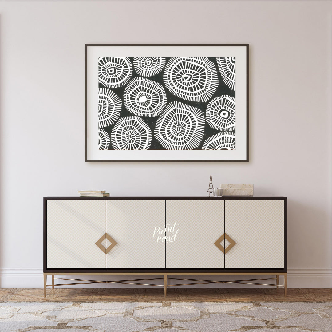 """Tribal Circles"" features a striking black and white pattern of stylized circular motifs, remini… for living room