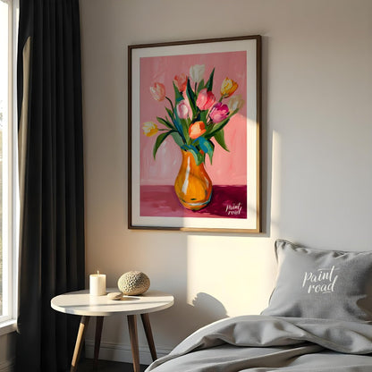 This charming artwork features a bouquet of tulips in a vibrant orange vase, set against a soft pin… for bedroom