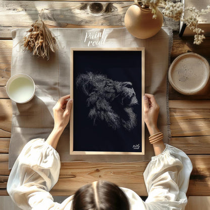 This evocative artwork features the profile of a lion's head, rendered entirely through a dense, in… for dining room