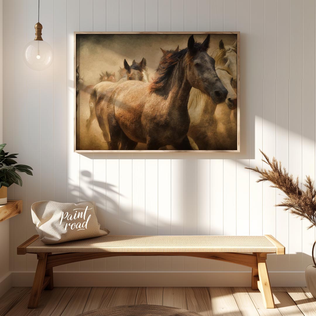 This captivating artwork portrays a herd of wild horses running through a dusty landscape, creating… for entryway