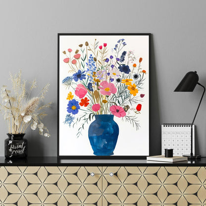 This enchanting painting, titled “Wildflowers in a Blue Vase,” presents a lush and diverse bouquet … for office