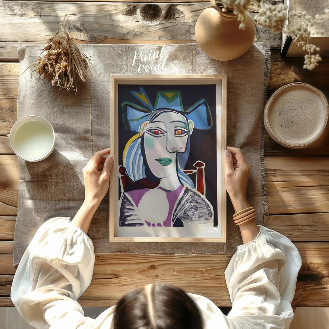 This striking portrait by Pablo Picasso, titled “Bust of a Woman with a Hat,” likely depicts his mu… for other