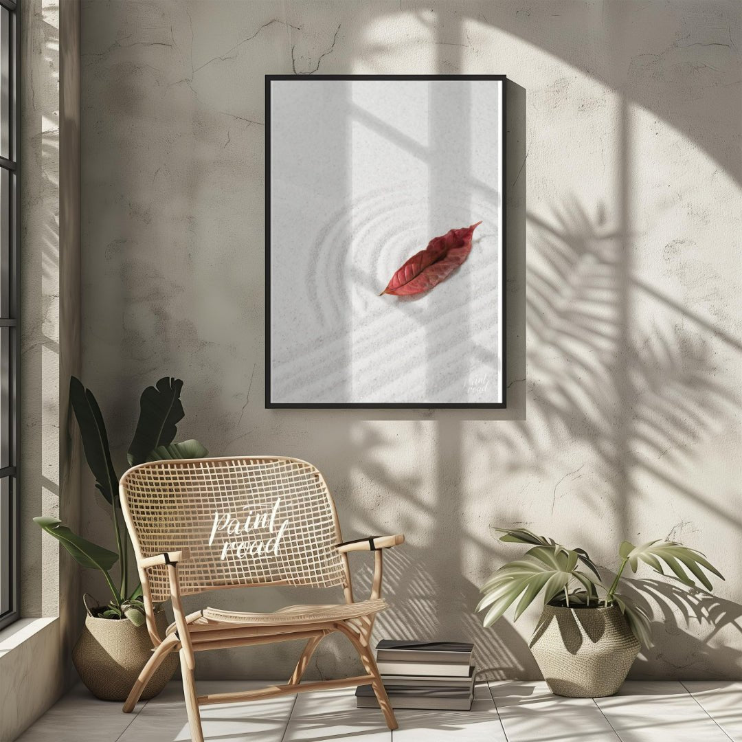 “Zen Leaf” captures a single, vibrant red autumn leaf resting delicately on a bed of pristine white… for living room