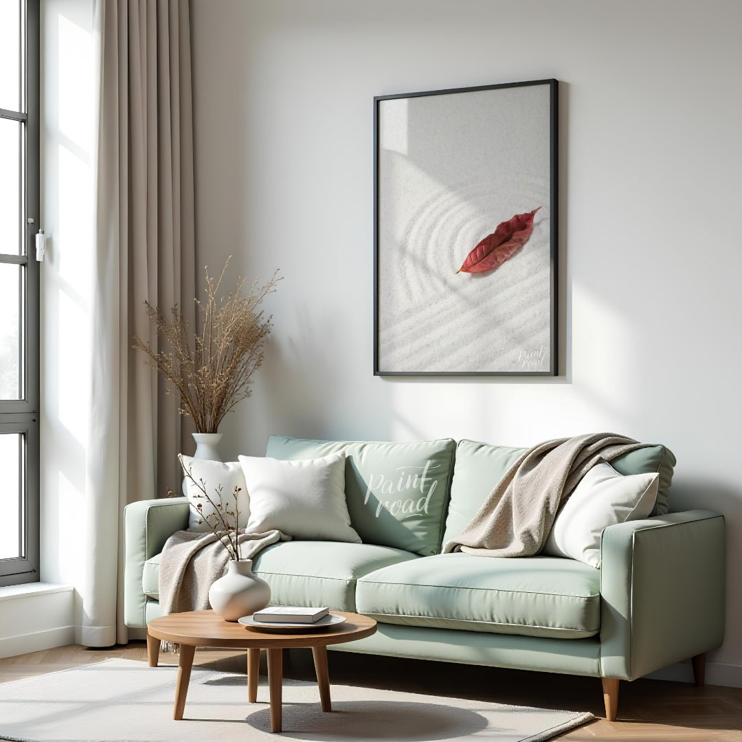 “Zen Leaf” captures a single, vibrant red autumn leaf resting delicately on a bed of pristine white… for living room